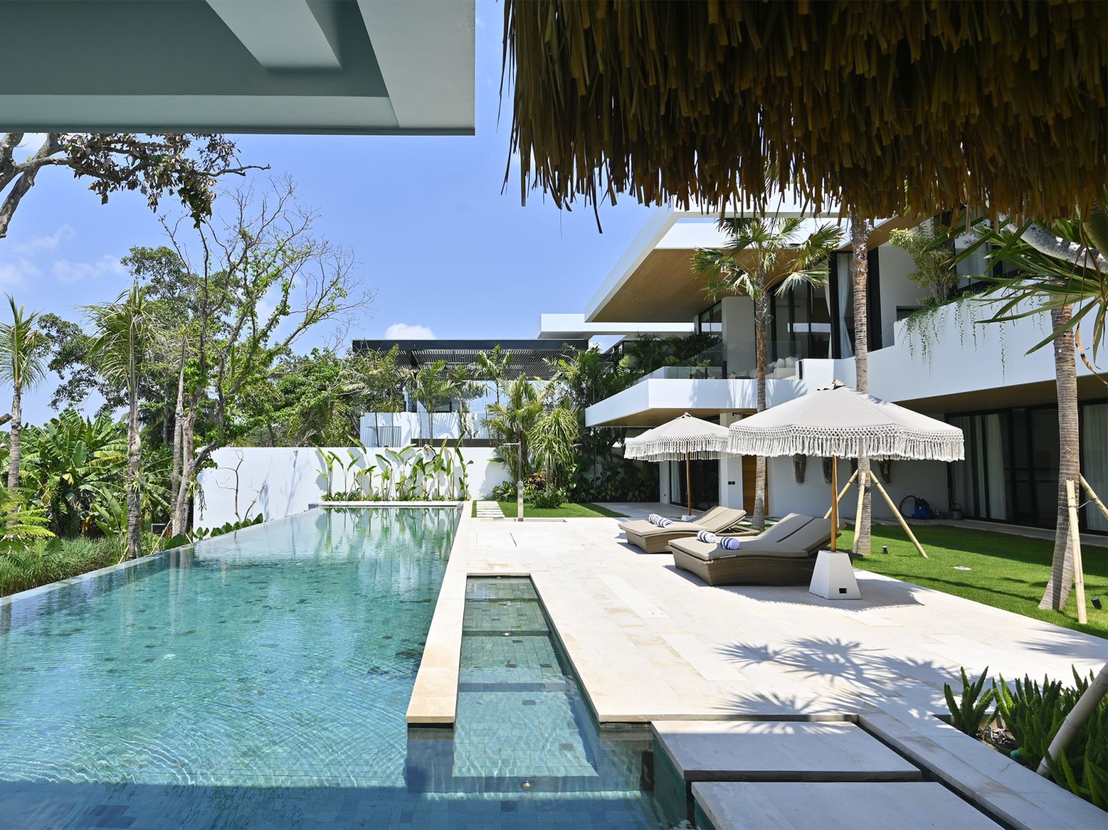 05 villa nica a captivating view of the pool deck from the sunken outdoor sala