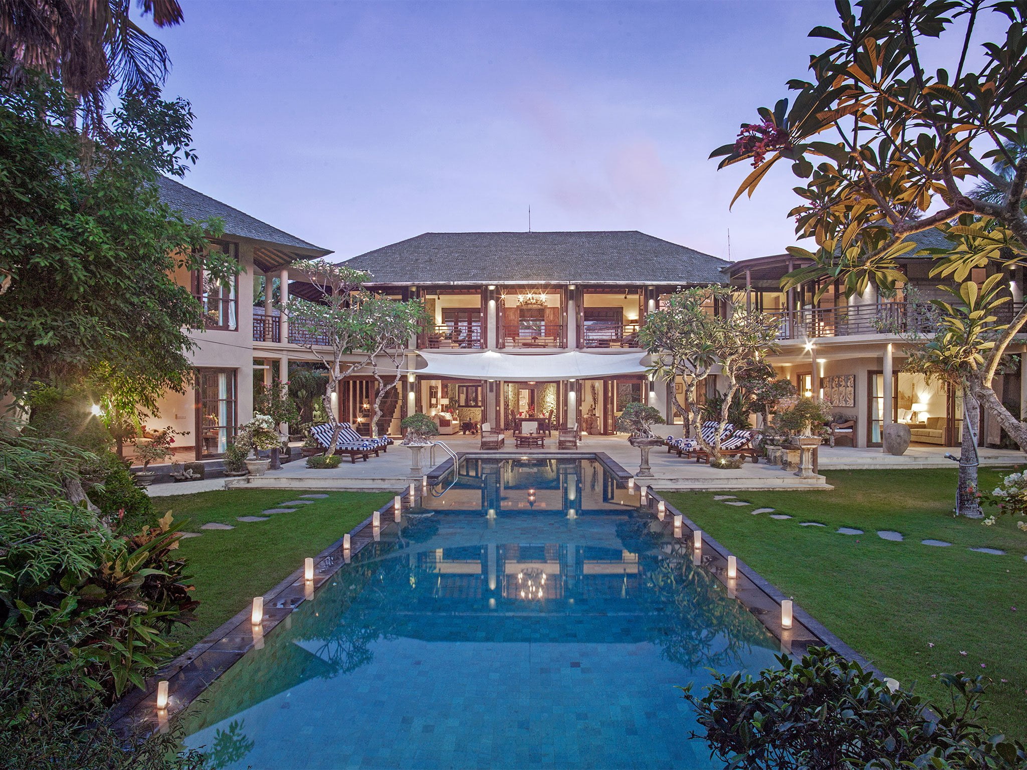 1. villa avalon main house view across pool to villa