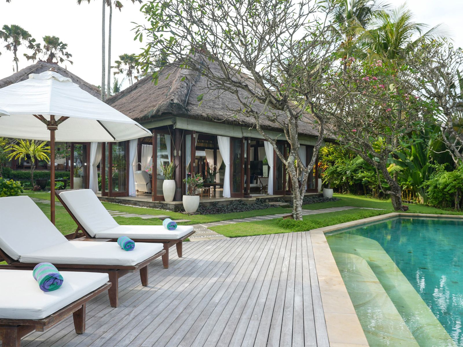 13 villa tanju inviting sunloungers by the pool