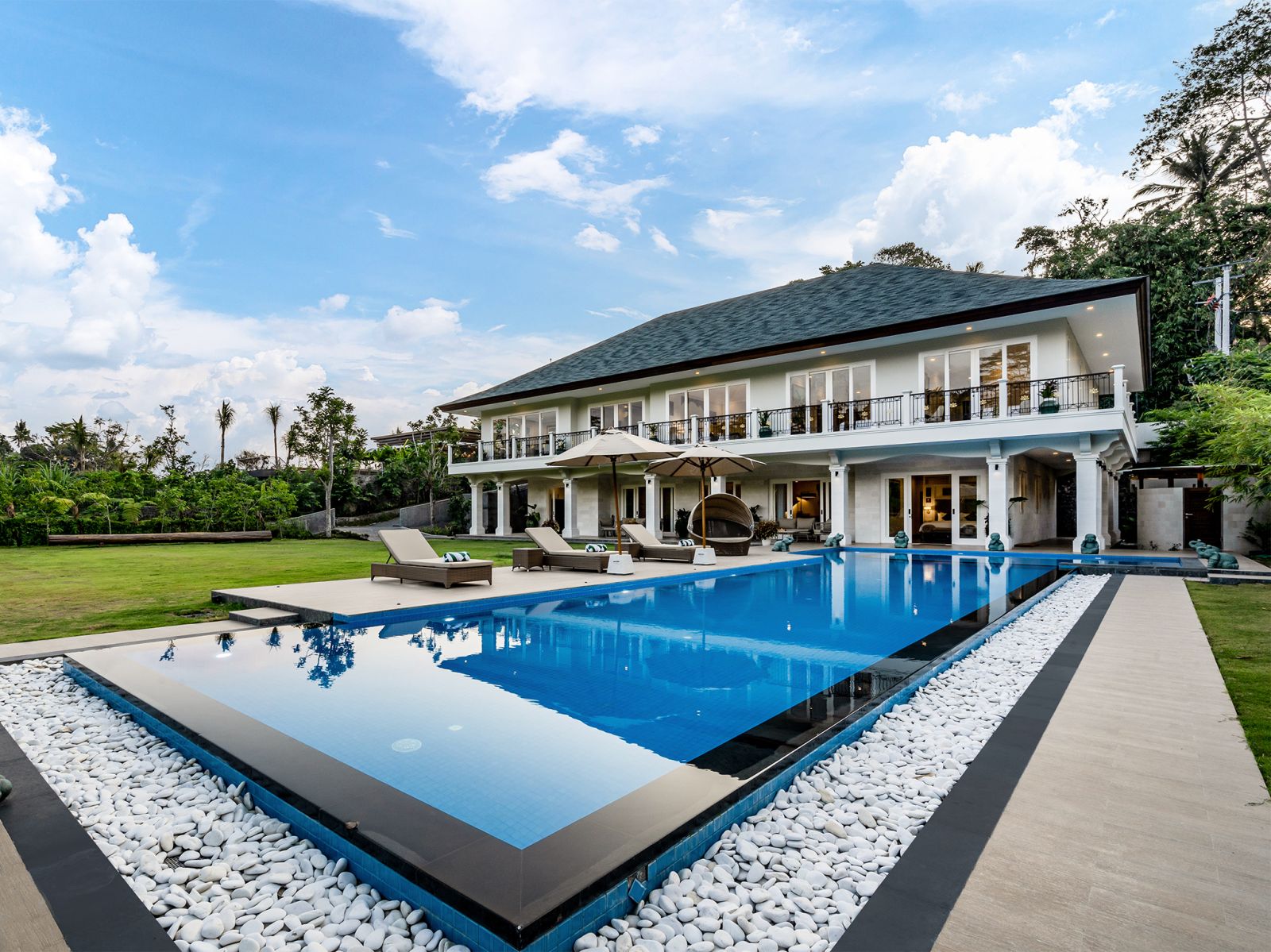 13 pala ubud villa agung expansive lap pool by the lawn