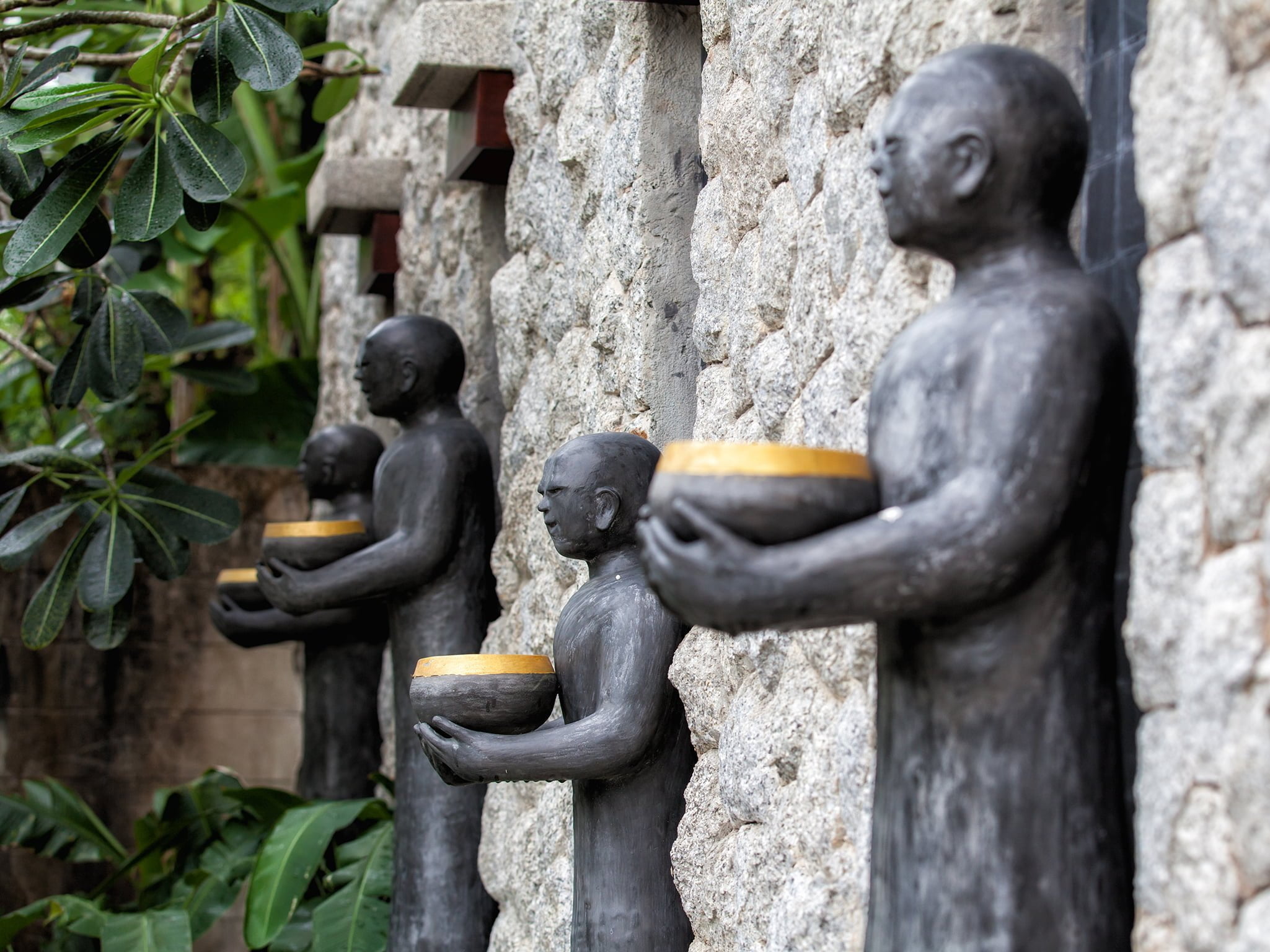 22 baan surin sawan front entrance wall statues