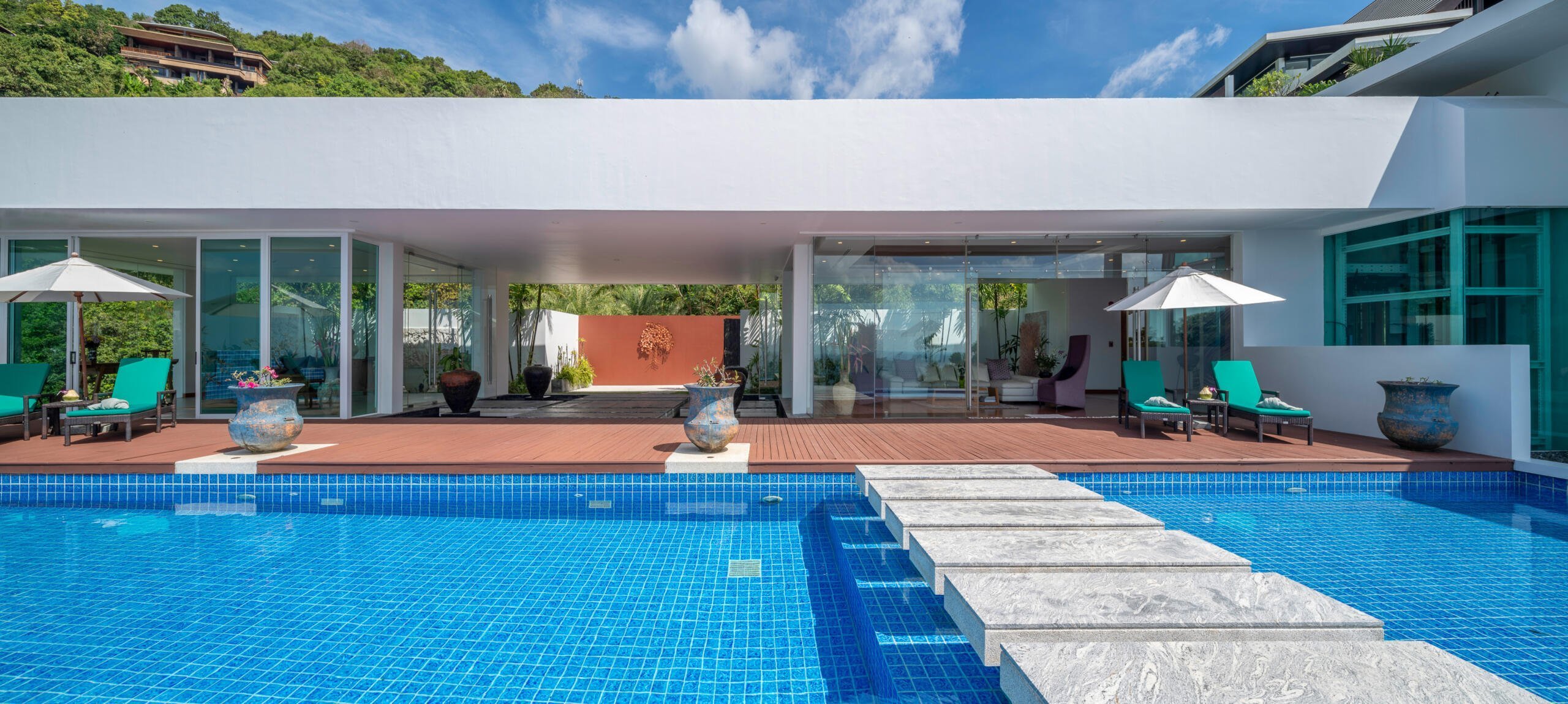 villa solaris main swimming pool walkway, entrance, sitting and lounge room exterior view
